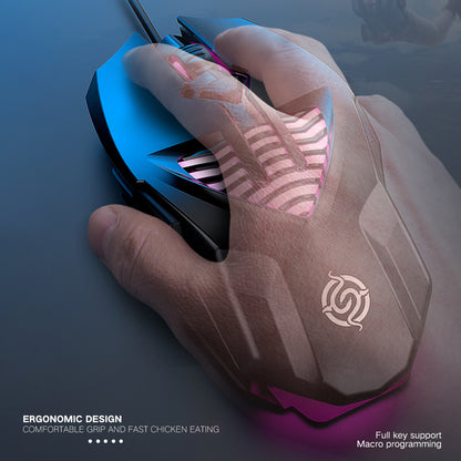 Hand holding a futuristic gaming mouse with illuminated design on a dark background